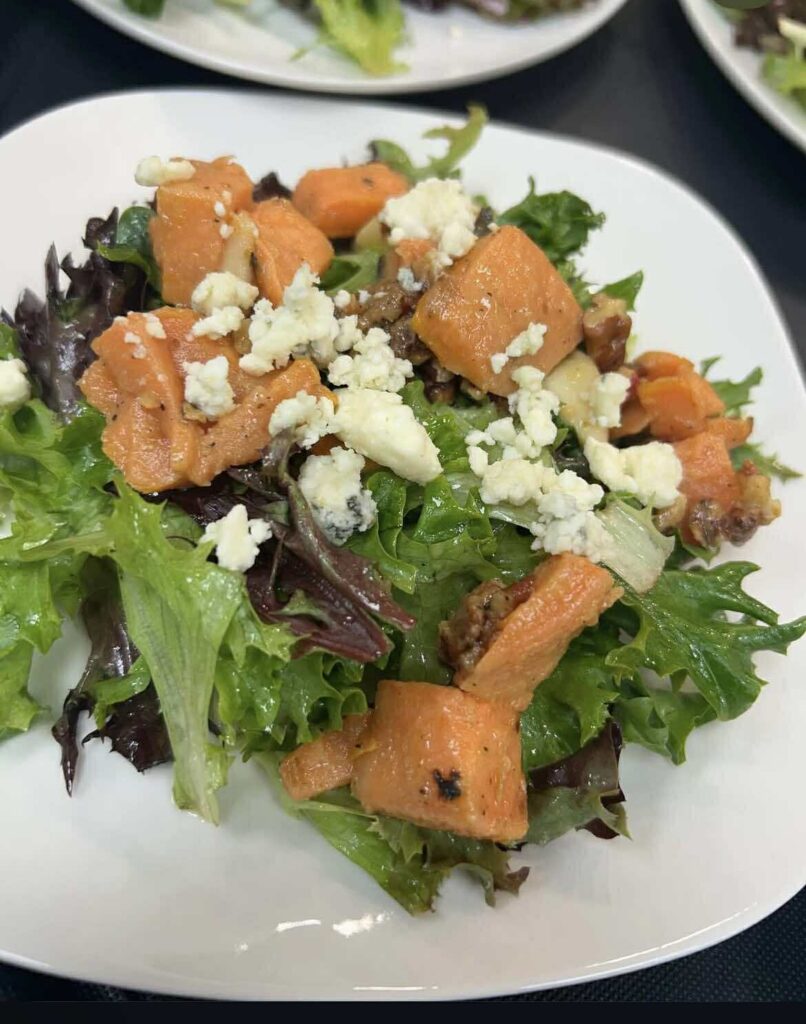 John 316 Center Taste Around the Lake 2025  close up image of gourmet salad